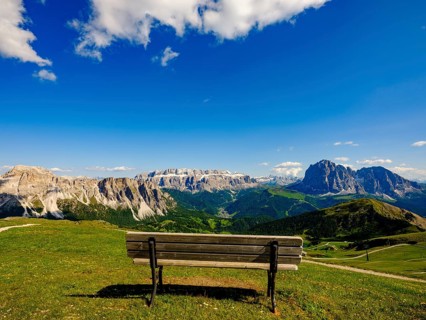 Lookout bench at the top of the Seceda with views of the Sella Group