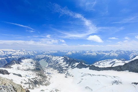 View from Oberaarhorn in direction Grimselpass to Oberaar Glacier and Oberaarsee