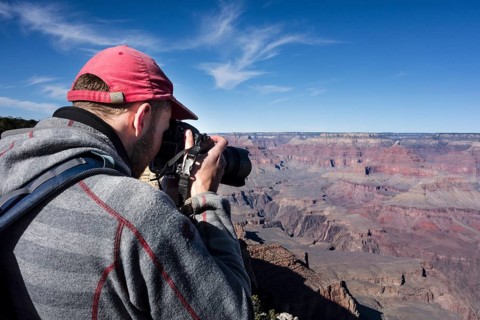 Tourist photographed in Grand Canyon