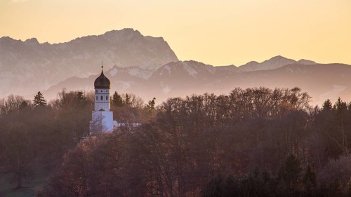 Church St. Johann Baptist protruding from trees