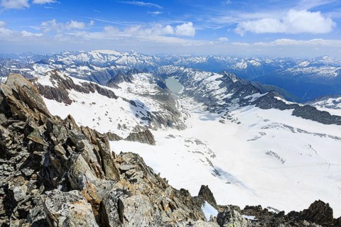 View from Oberaarhorn in direction Grimselpass to Oberaar Glacier and Oberaarsee