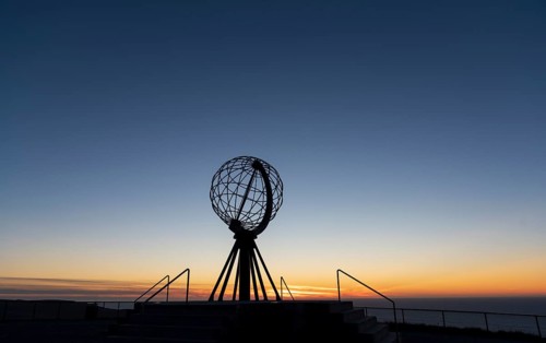 North Cape with steel globe after sunset