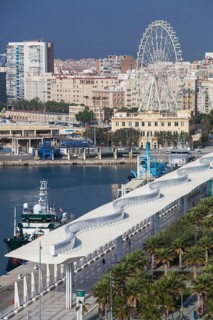Ships and Palmeral De Las Sorpresas in the port of Malaga