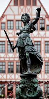 Justitia with scales and sword