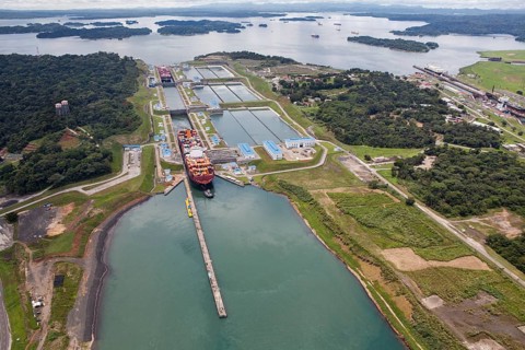 Aerial view of two Neo-Panamax container ships crossing the third set of locks at the pacific side