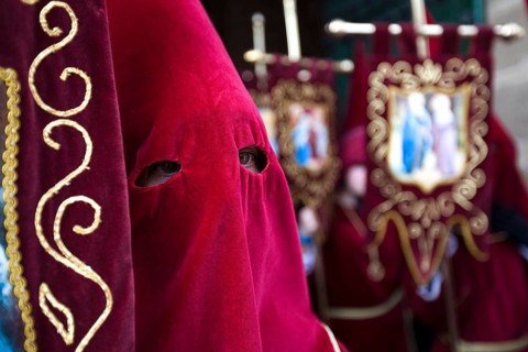 Penitent with traditional headgear