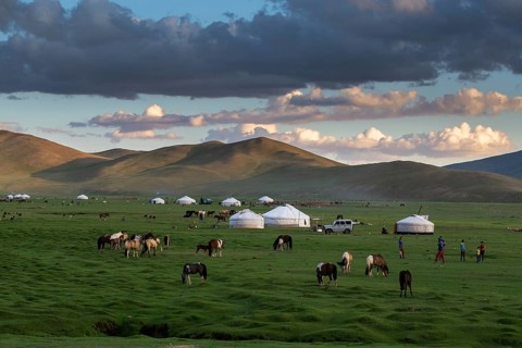 Summer evening in summer camp. Tsambagarav mountain