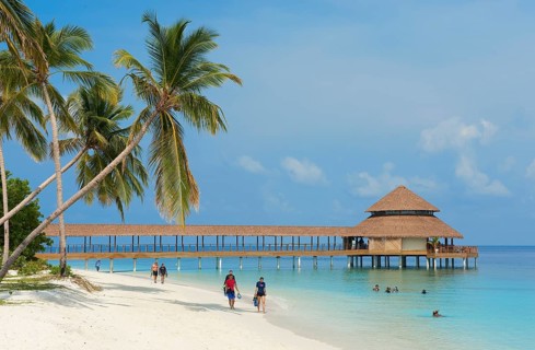 View of beach and jetty from restaurant on stilts in lagoon
