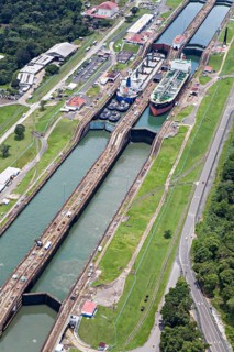 Gas and fuel tanker ships cross Gatun lock from the Pacific side
