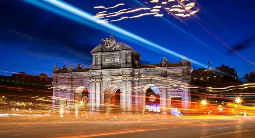 Puerta de Alcala with Christmas lights at dusk