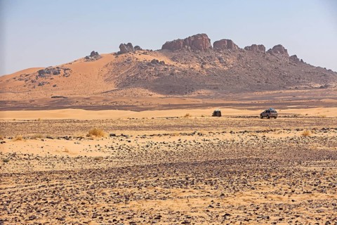 Off-road vehicle on gravel road to the high Atlas Mountains