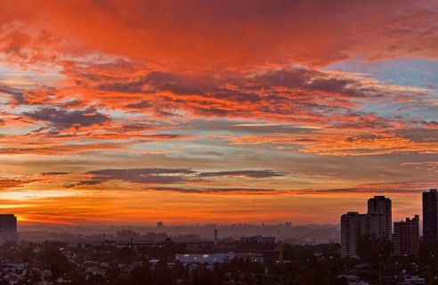 Sunset in Alphaville neighborhood with the skyline of Sao Paulo in the background
