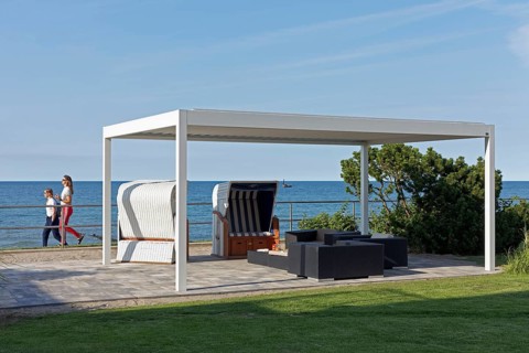 Pavilion with two beach chairs and view of the Baltic Sea
