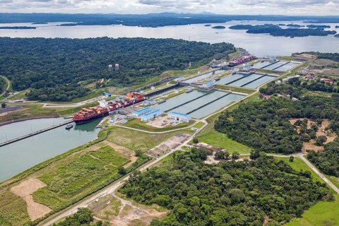 Aerial view of two Neo-Panamax container ships crossing the third set of locks at the pacific side