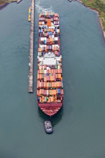 A Neo-Panamax container ship heading to the Atlantic side in Panama Canal