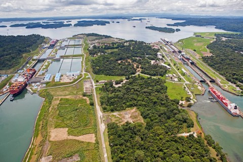 Aerial view of two Neo-Panamax container ships crossing the third set of locks at the pacific side