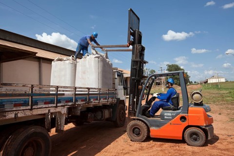 Worker Manouvers Lift Truck with One and a Half Ton Coffee Sacks near Luis Eduardo Magalhaes