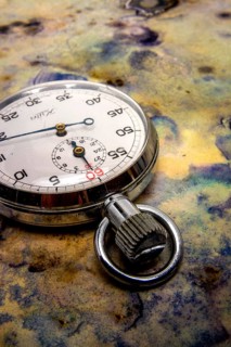Old stop watch on marbled base