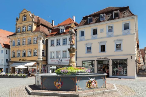Madonna with a crescent moon on the Marienbrunnen fountain on Marktplatz square