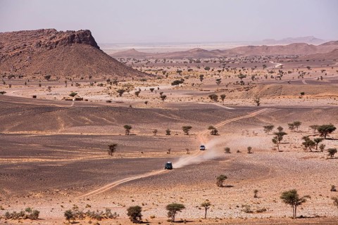 Off-road vehicle on gravel road to the high Atlas Mountains