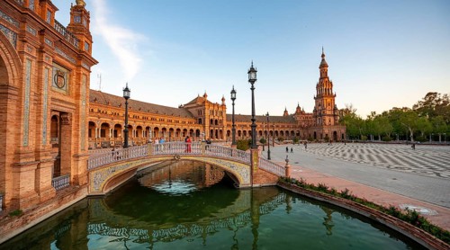 Plaza de Espana in the evening light with reflection