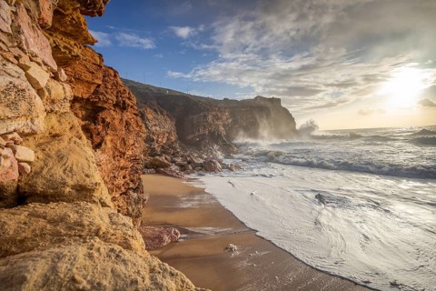 Restless sea at North Beach of famous Nazare