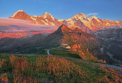 Mountain meadow on the Maennlichen with the triumvirate of the Eiger
