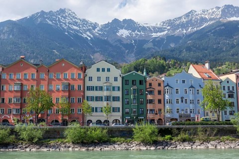 Colourful buildings Mariahilf along the river Inn