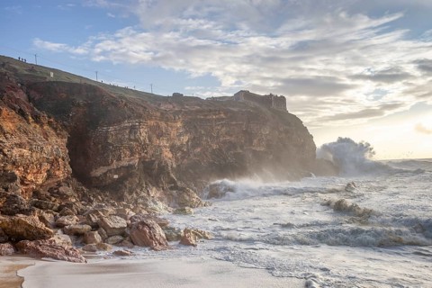 Restless sea at North Beach of famous Nazare
