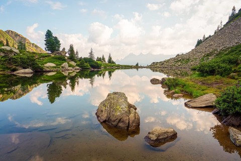 Mirror lake at first light with the Hoher Dachstein in the background