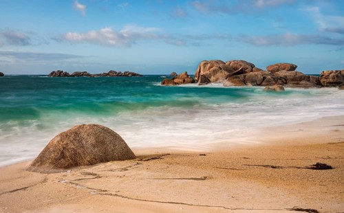 Sandy beach and granite rocks in Brittany