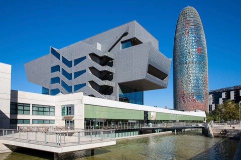 Skyscraper Torre Agbar with the museum Museu del Disseny de Barcelona