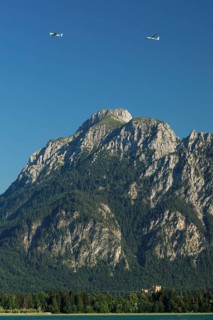View over the Forgensee to Hohenschwangau Castle and the Tannheim mountains