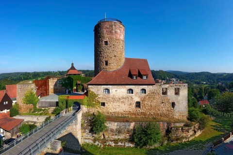 Castle ruin Thann castle with fortified defence tower and moat