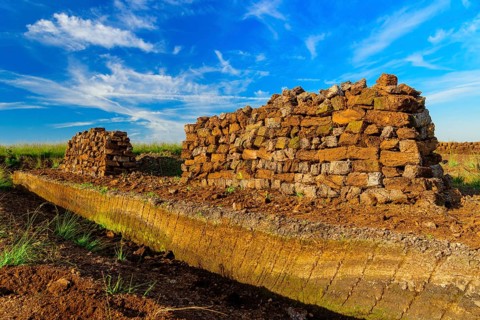 Peat sods stacked up for drying in the bog