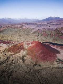 Red volcano and lava field at the Gerouberg Cliffs