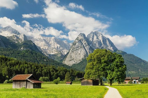 Hay barns at Hammersbach hiking trail towards Wetterstein range