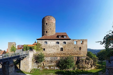 Castle ruin Thann castle with fortified defence tower and moat