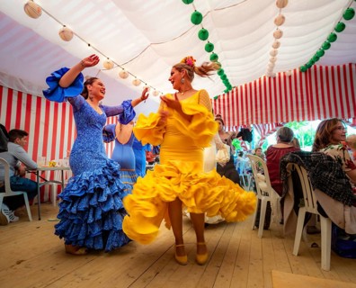 Women dancing Sevillano