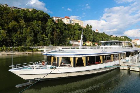 Danube with excursion boat at the quay