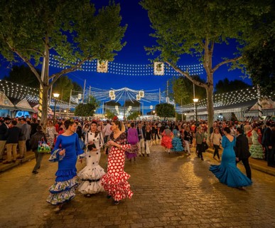 Spanish woman with colourful flamenco dresses
