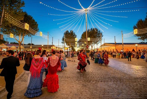 Spanish woman with colourful flamenco dresses