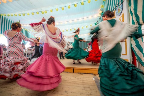 Young woman dancing Sevillano