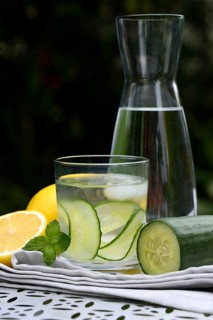 Cucumber water in glass and lemon