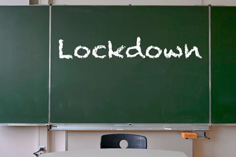 Board with inscription LOCKDOWN