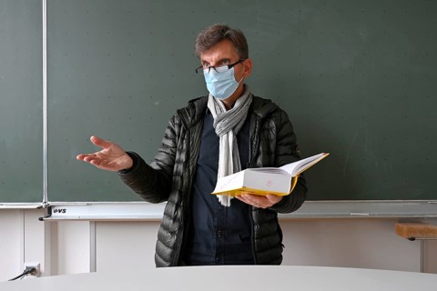 Teacher with thick winter jacket