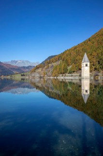 Sunken church tower in the reservoir at the Reschenpass