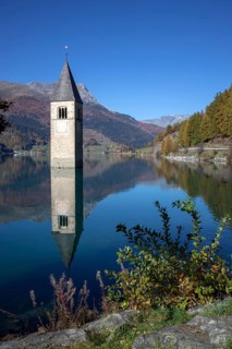 Sunken church tower in the reservoir at the Reschenpass
