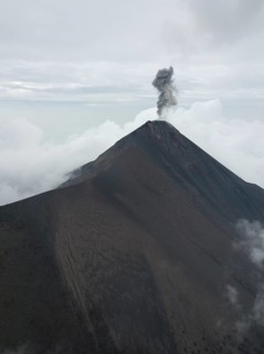 Smoke spitting volcano