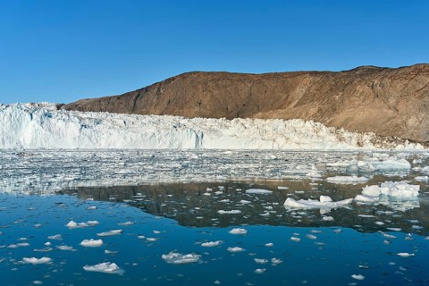 Eqi glacier with drift ice in the foreground